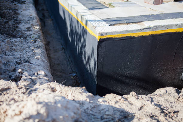 Professional Emergency Waterproofing technician working in Kendallville, IN